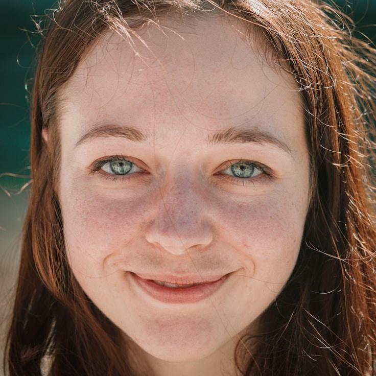 Kaveri Mehta, Lead Design Curator at WillowCrestStudio, reviewing corporate floral arrangements